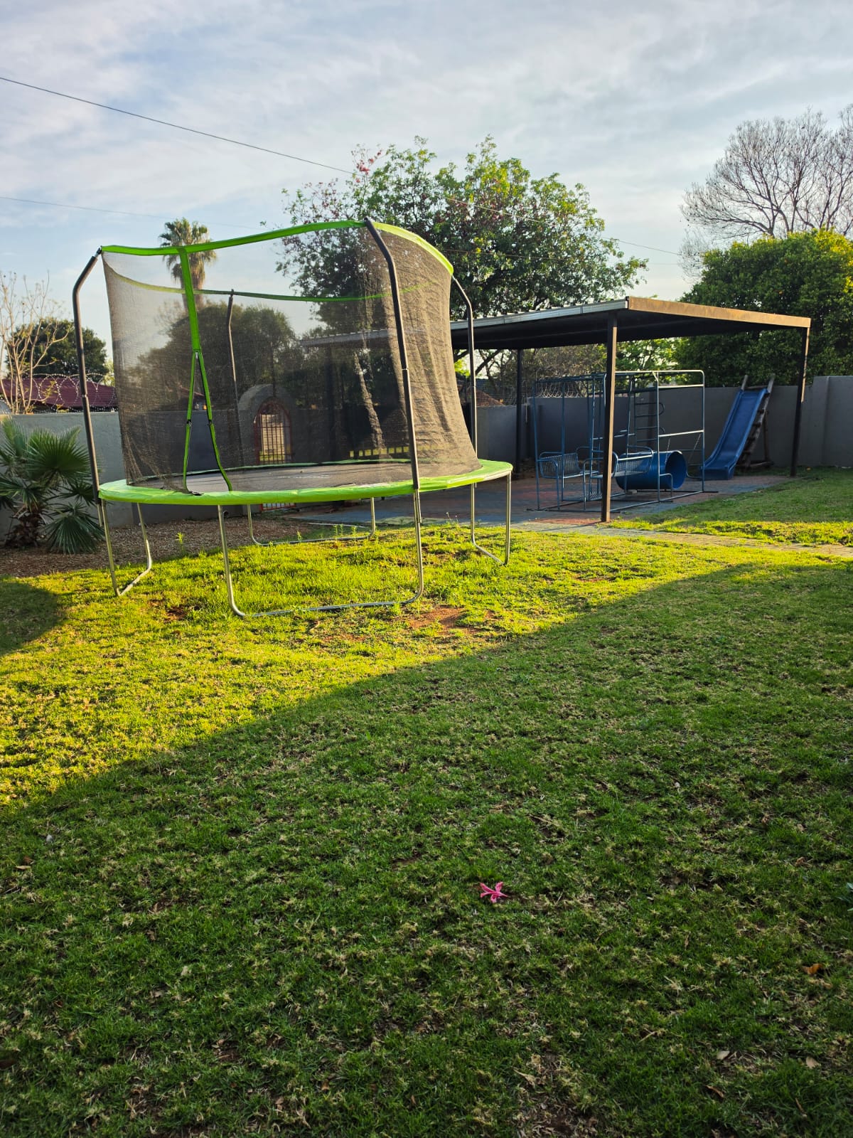 The garden and trampoline area